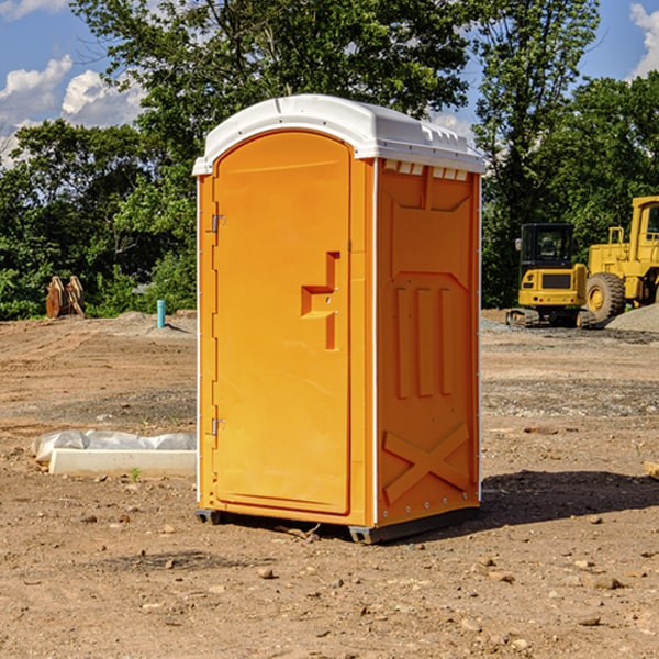 how often are the porta potties cleaned and serviced during a rental period in Wallace